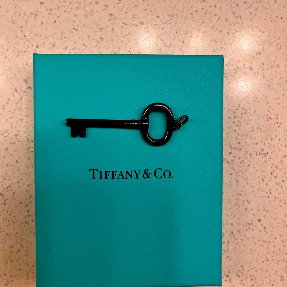 Tiffany & Co black titanium key charm